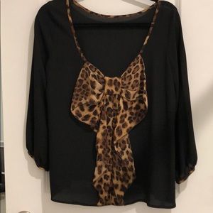 Like NEW. Sheer black blouse w/ cheetah detail